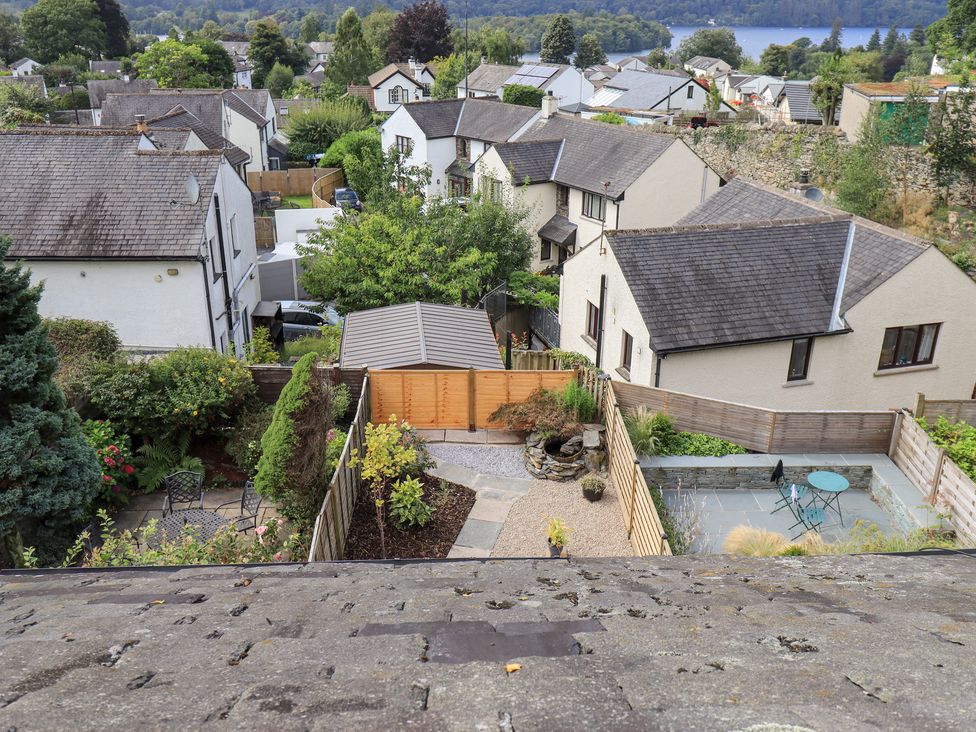 An outdoor view of houses and gardens at Stoker’s Cottage in Bowness-On-Windermere