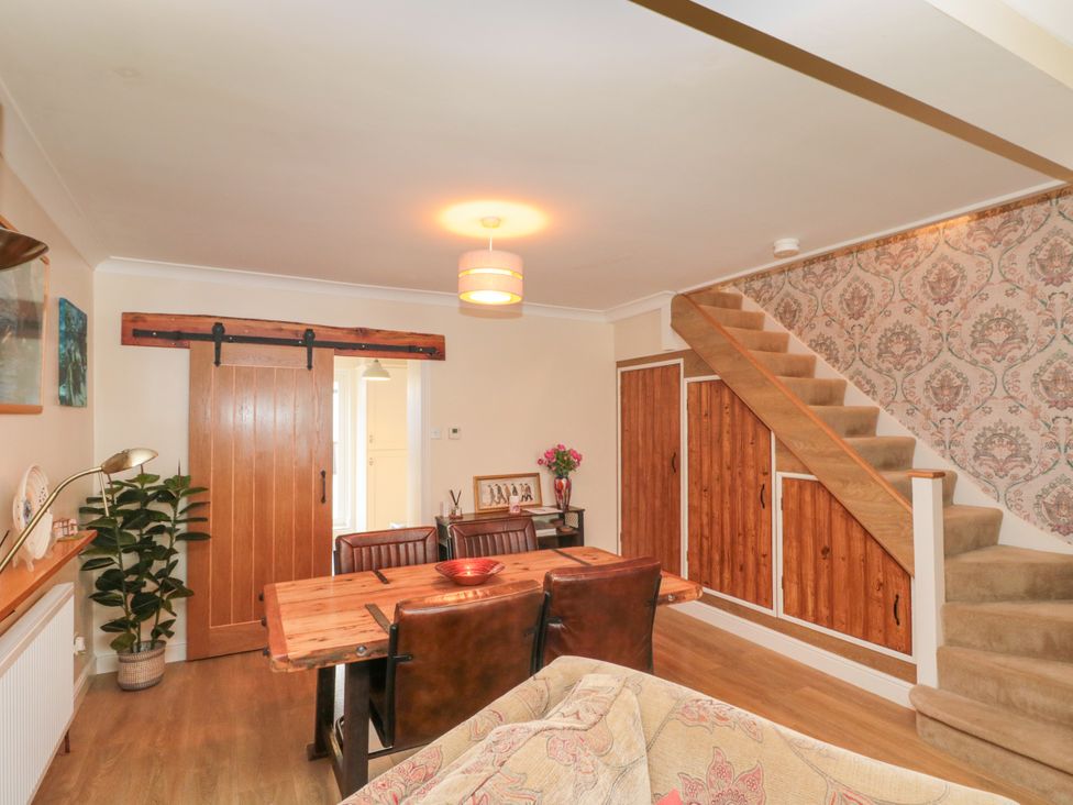 A dining room with a table and chairs at No.64 Nelson St Bridlington