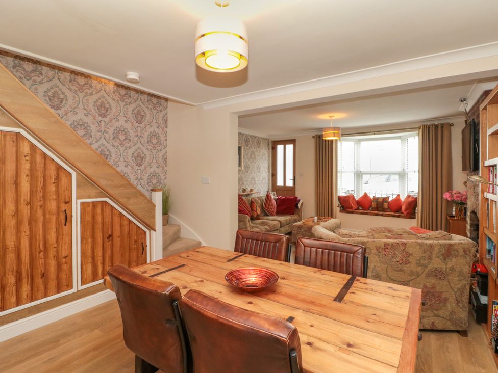 A dining room with a table and chairs at No.64 Nelson St, Bridlington