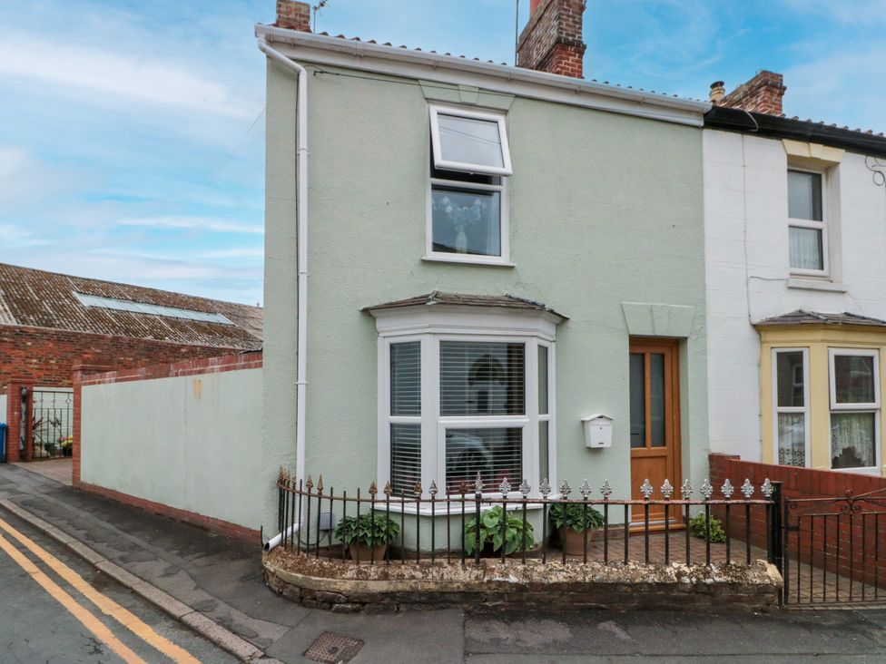 A house with a fence and plants at No.64 Nelson St in Bridlington