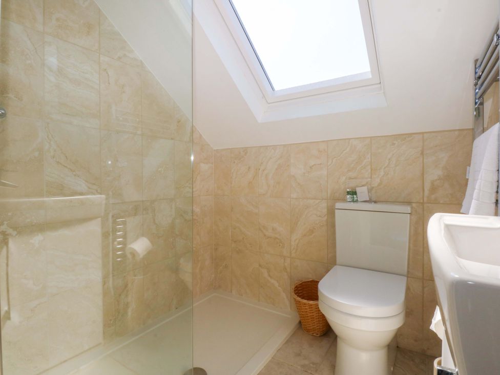 A bathroom with shower and toilet at Swn Y Don in 