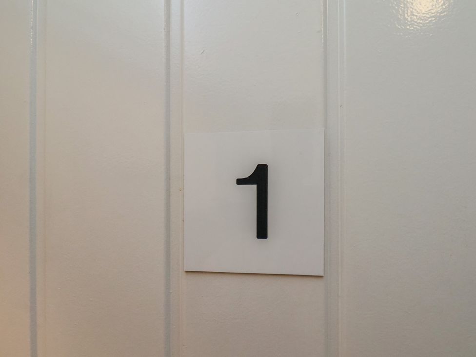 A door with the number 1 at Glenholme Apartment 1 Redcar