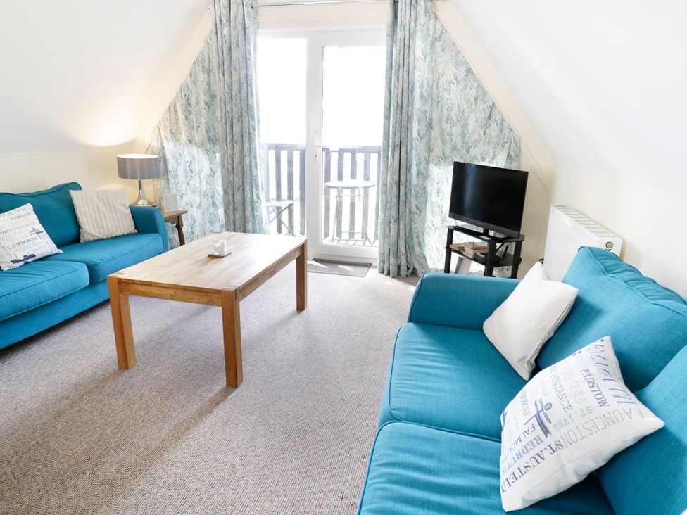 A living room with a sofa and coffee table at Valley Lodge 2 in Callington