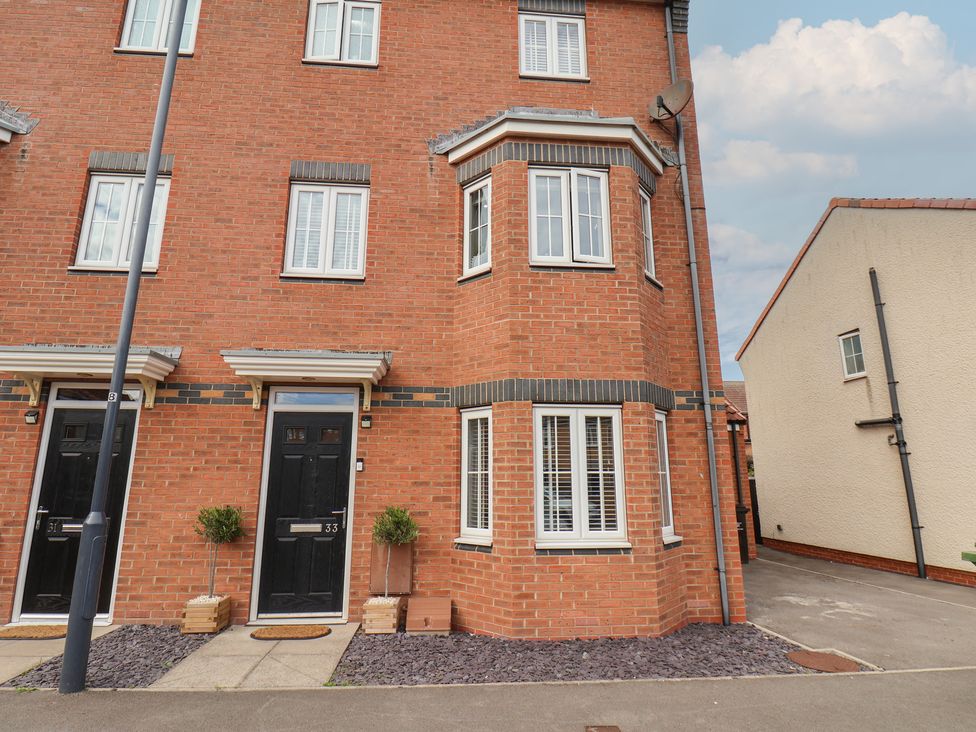A house exterior with front door and windows at 33 Murrayfield Gardens in Whitby