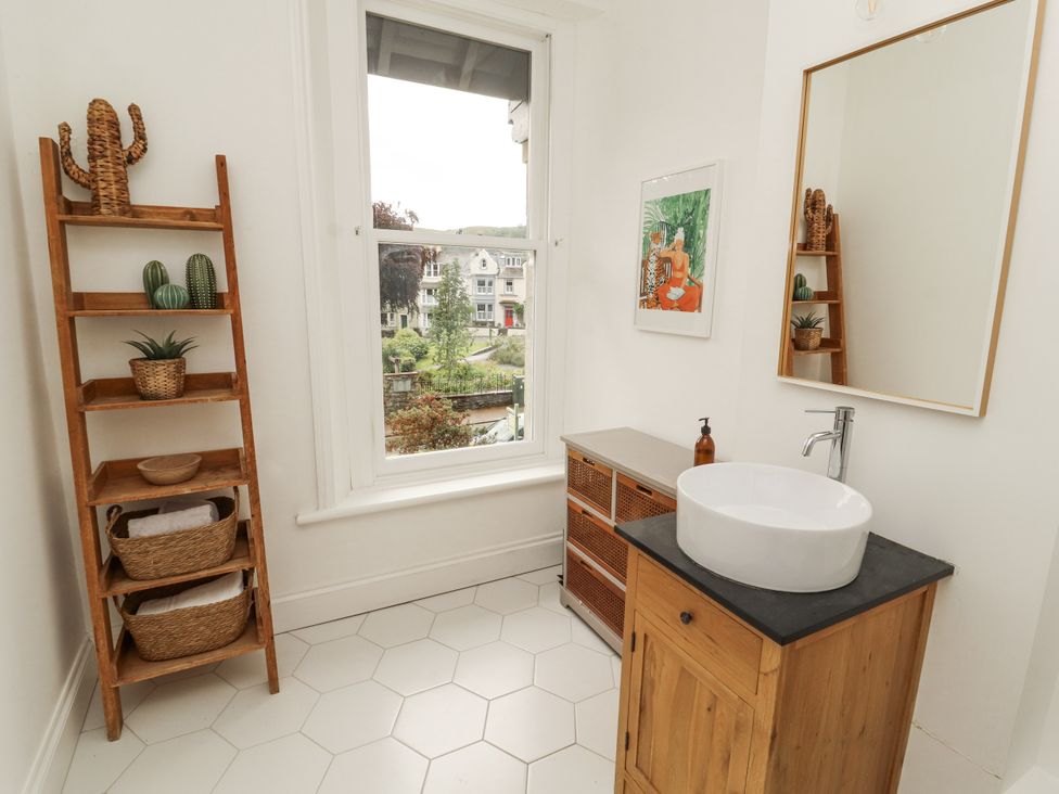 A bathroom with a wash basin and cabinet at 43 Station Road in Keswick