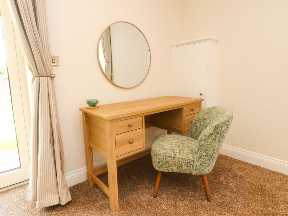 An office with a desk and chair at Heron View