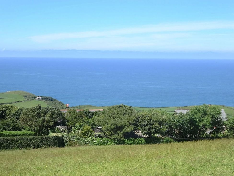 A view of the ocean and hills at Tremorla in Boscastle