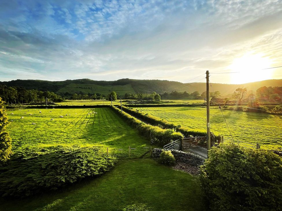 A landscape view of fields and hills at Grove House in Grange-Over-Sands