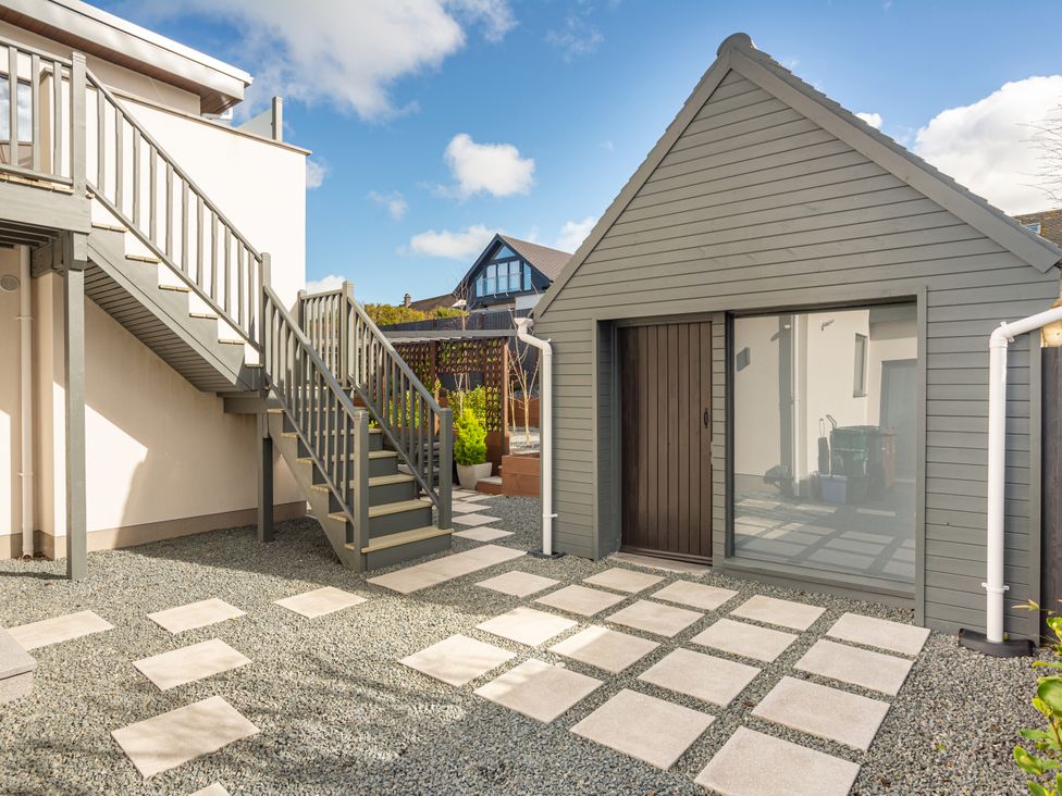 An outdoor area with stairs and a shed at 70 Deganwy Road in Deganwy