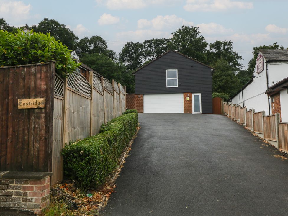 A house with a garage and fence at The Annex in 