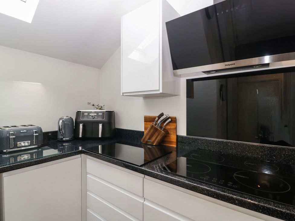 A kitchen with appliances on the countertop at The Annex