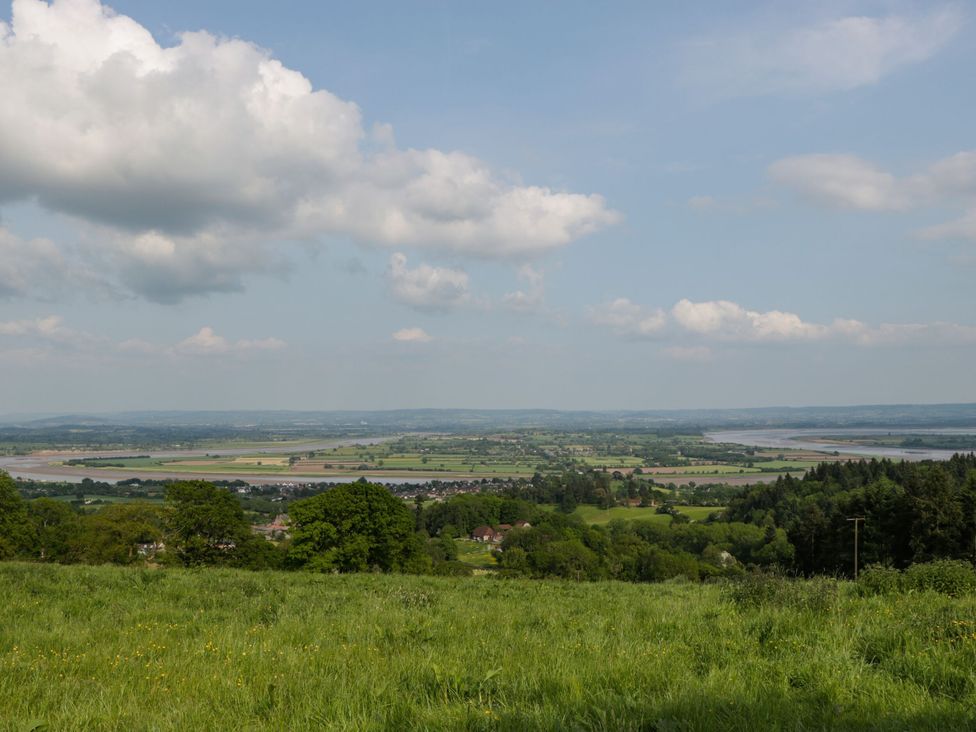 A landscape view with hills trees and a river at The Annex in 