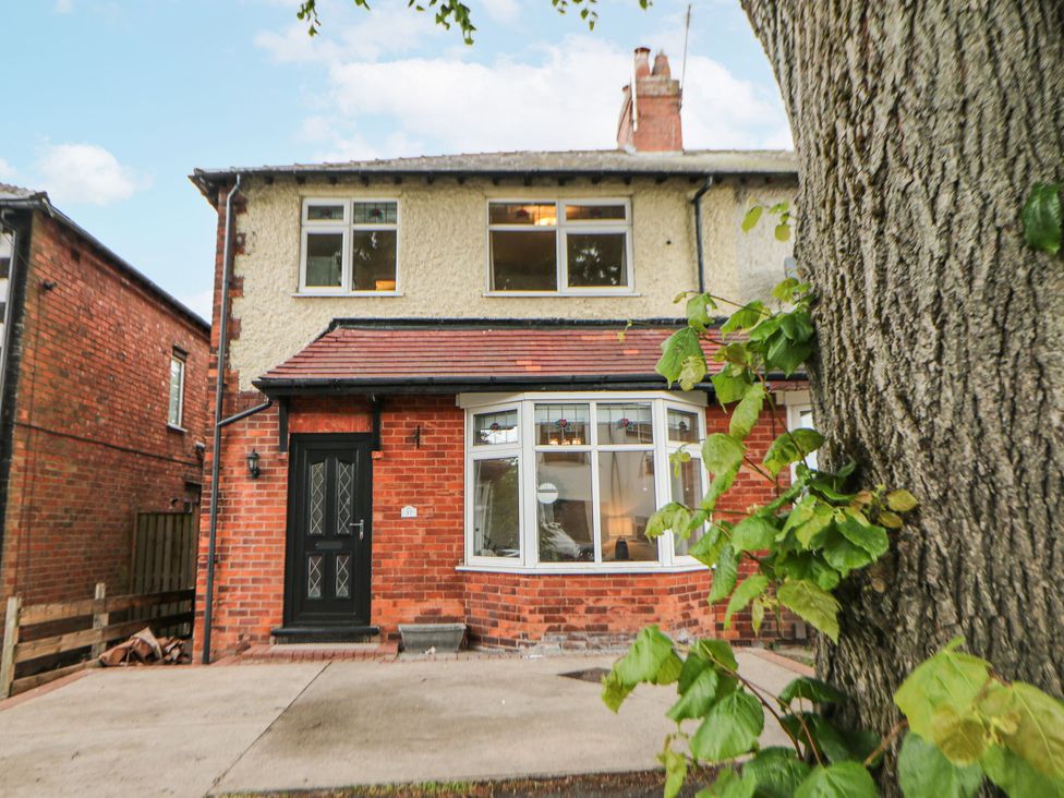 A house with a front door and windows at 37 Berry Hill Lane Mansfield