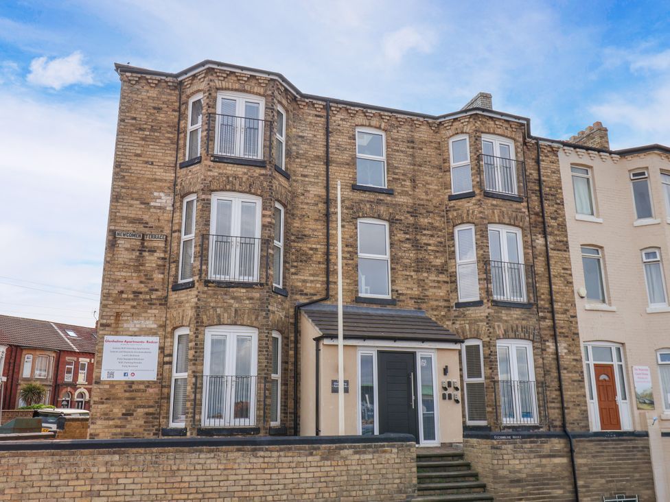 An apartment building with balconies at Apartment 3 ( 2 bed ) Redcar