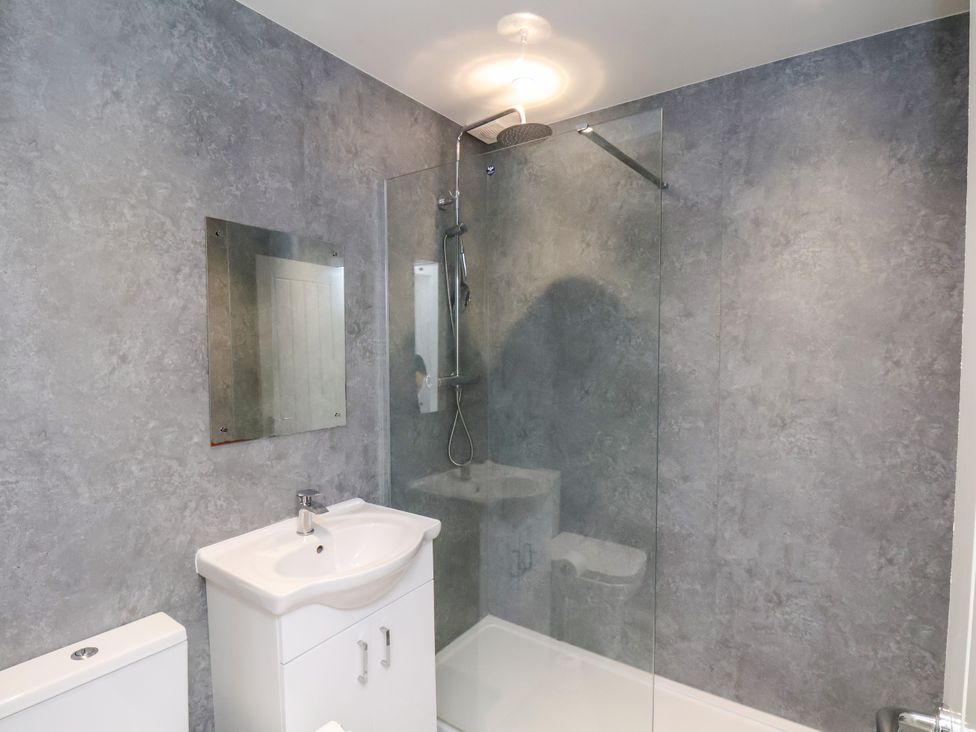 A bathroom with sink and shower at Apartment 3 ( 2 bed ) Redcar