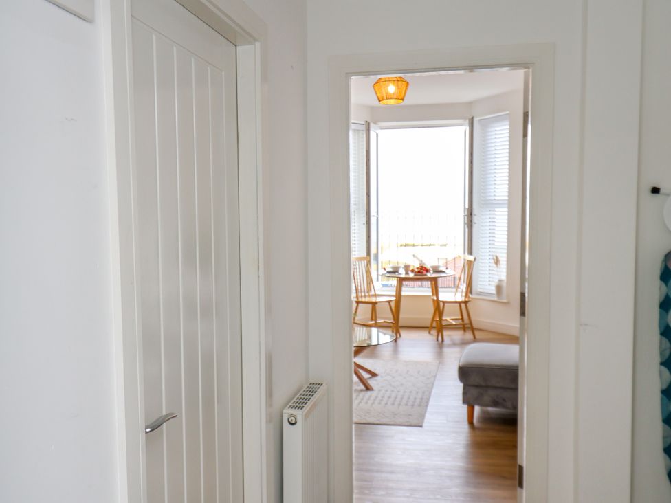 A dining room with a table and chairs at Apartment 4 ( 1 bed ) in Redcar
