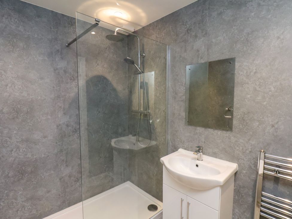 A bathroom with a shower and sink at Apartment 4 ( 1 bed ) in Redcar