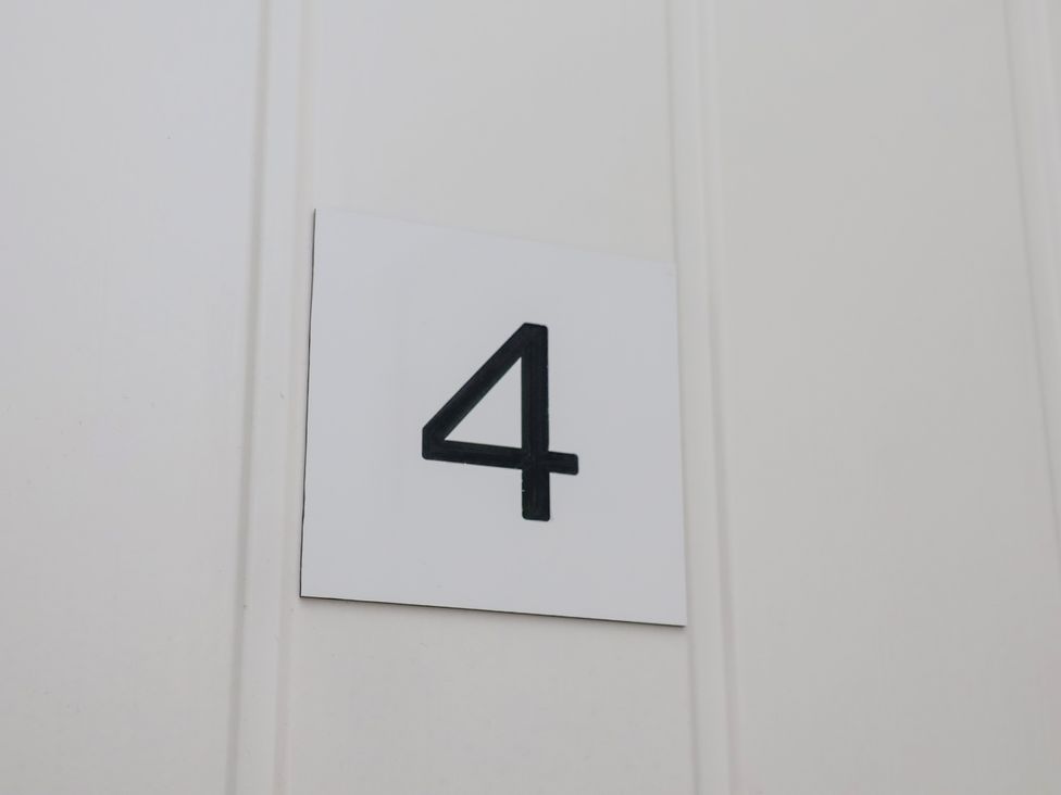 A door sign with the number 4 at Apartment 4 (1 bed) Redcar