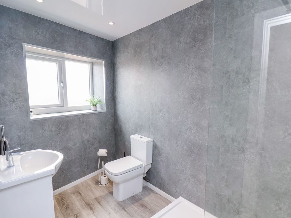 A bathroom with a toilet and sink at Apartment 5 (1 bed) Redcar