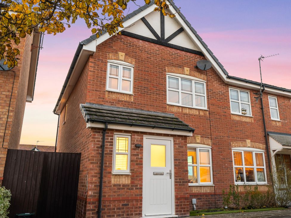 A house with windows and a door at Hafan Rhos Rhos-On-Sea