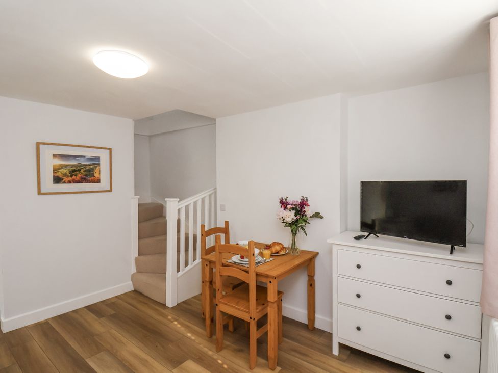 A dining room with a table and chair at 96 Church Street in Guisborough