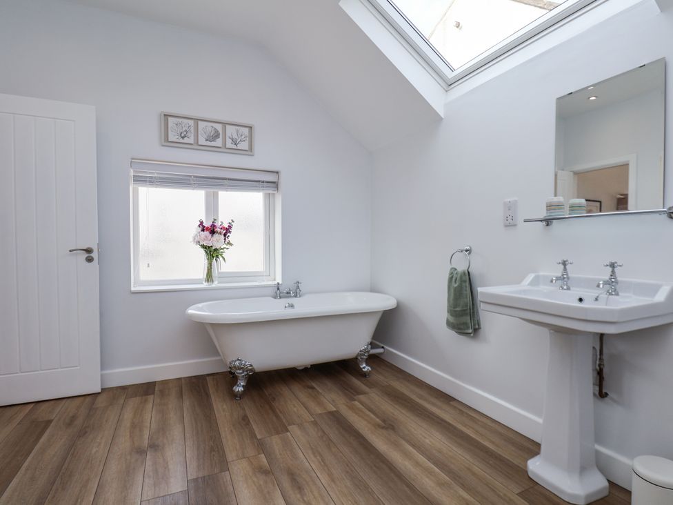 A bathroom with a bathtub and sink at 96 Church Street in Guisborough
