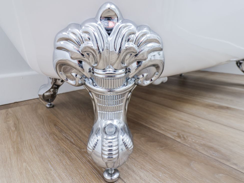 A close-up view of a clawfoot bathtub leg at 96 Church Street, Guisborough