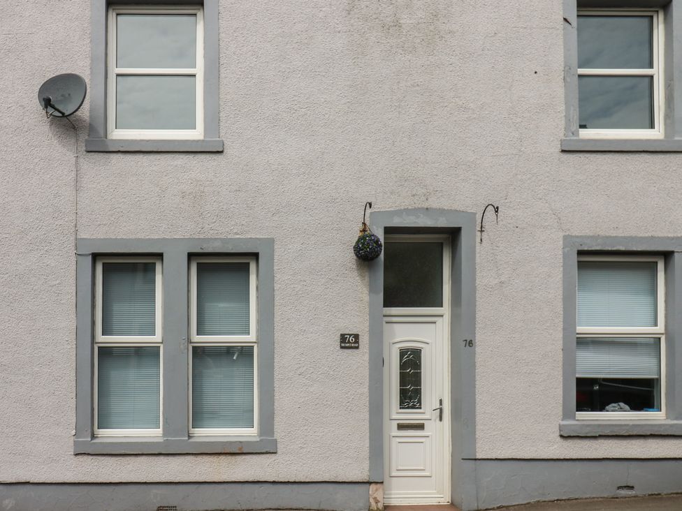 An exterior view of a building with windows and a door at Ennerdale Edge in Cleator