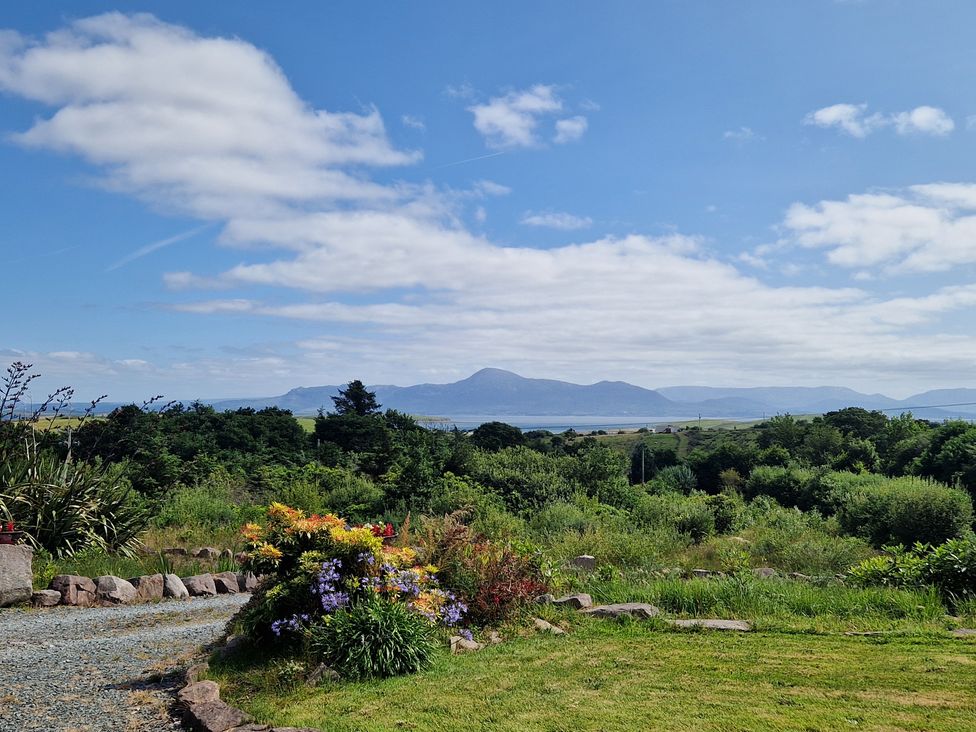 A view of mountains and flowers overlooking a landscape at Moynish Mor Mulranny, Mulranny, County Mayo