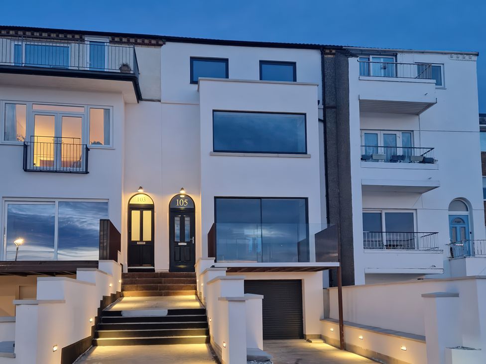 A building facade with doors and windows at Mostyn View West Kirby