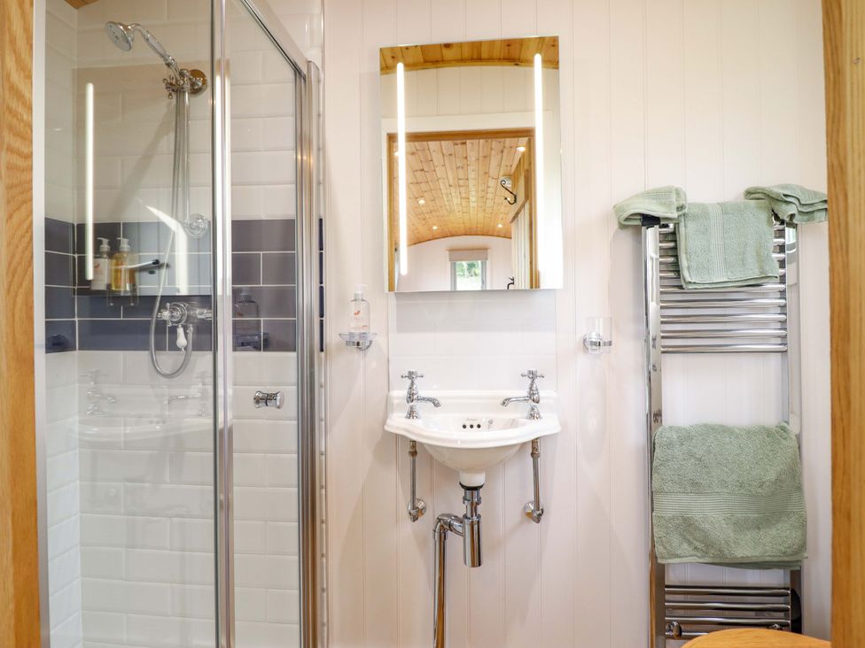 A bathroom with shower and sink at Cheviot in Oswestry