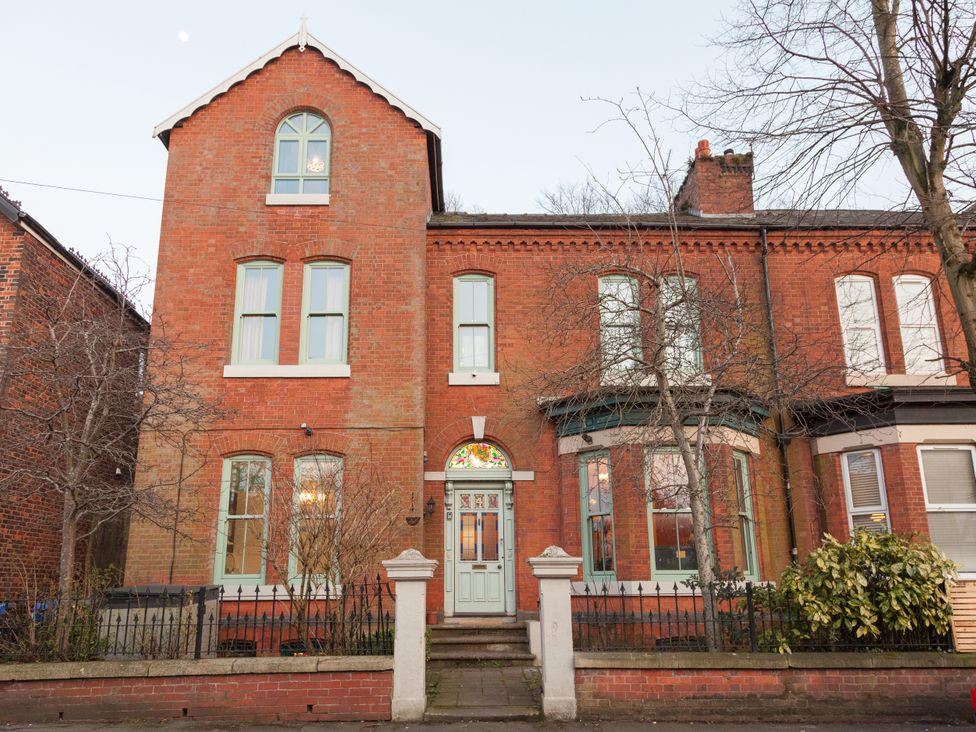 A house with windows and a front door at 4 Kingscliffe Street in Manchester