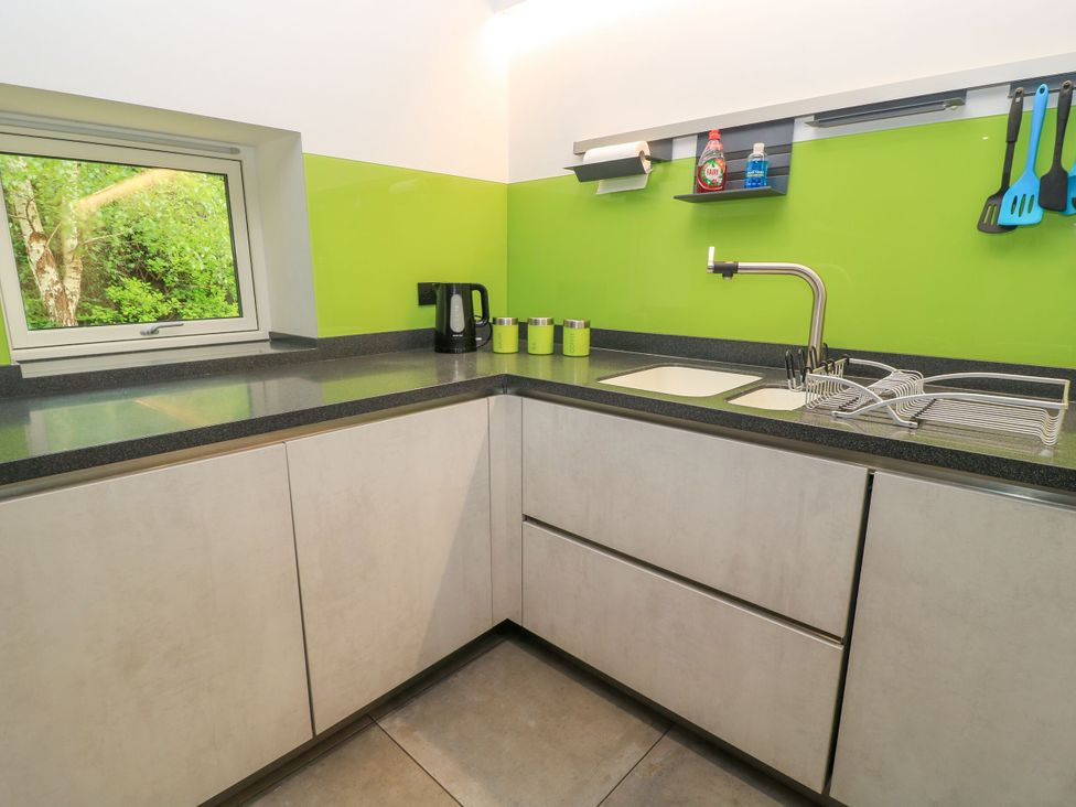 A kitchen with a sink and kettle at Silver Copse Frilford Heath Near Abingdon