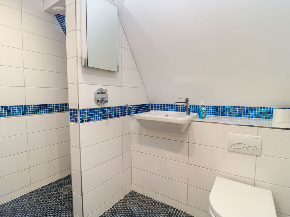 A bathroom with a sink and toilet at Silver Copse Frilford Heath Near Abingdon