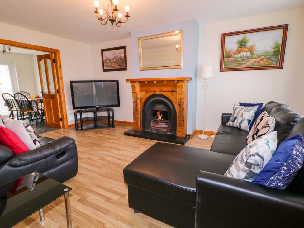 A living room with a sofa and television at 7 Killybrack Glen Omagh
