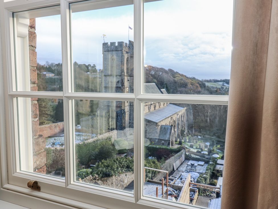 View from a window showing a church and garden at 26 Frenchgate in Richmond