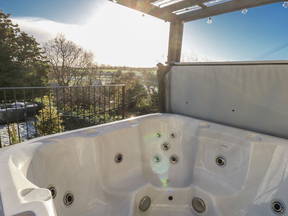 A hot tub overlooking a landscape at 26 Frenchgate in Richmond