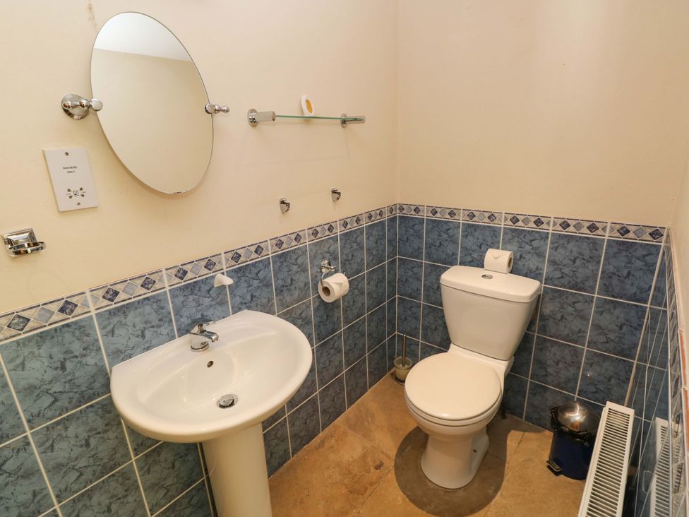 A bathroom with a sink and toilet at Carreg Las Haverfordwest