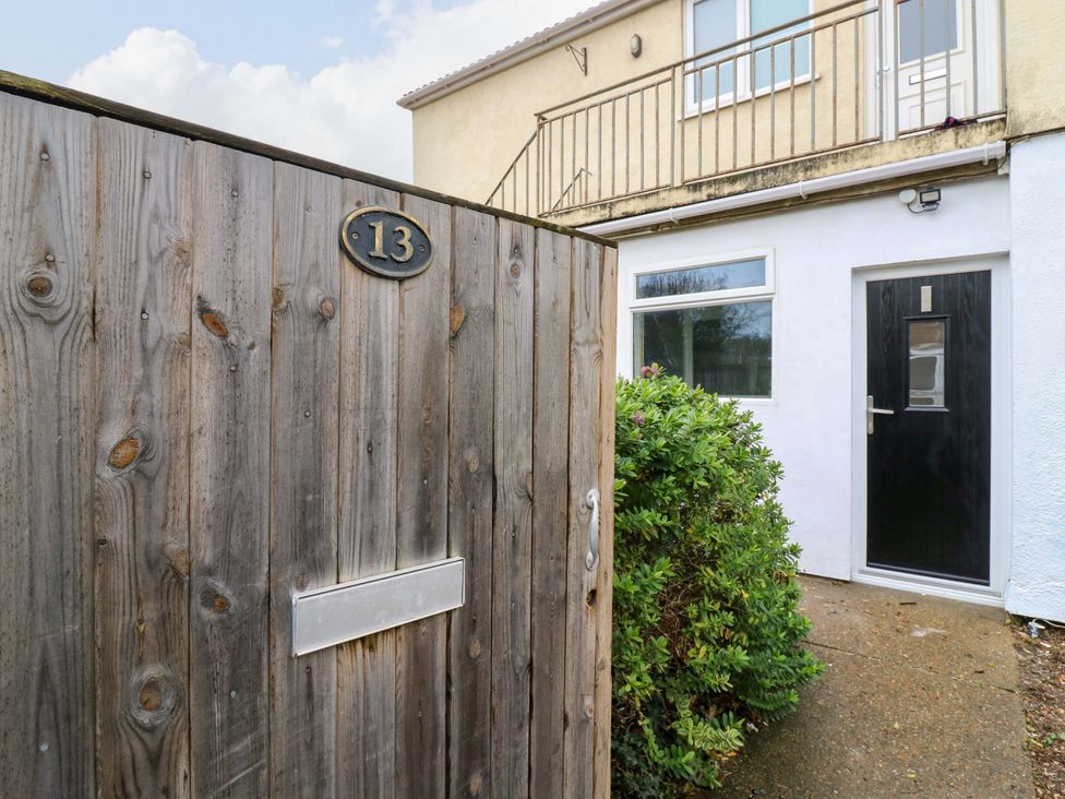 An entrance with a gate and door at High Tide in Whitstable