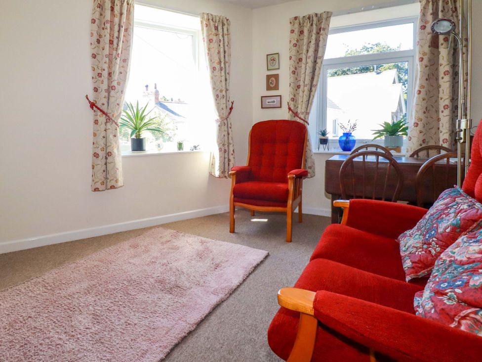 A living room with chairs and a table at Chyancrowse in Gulval