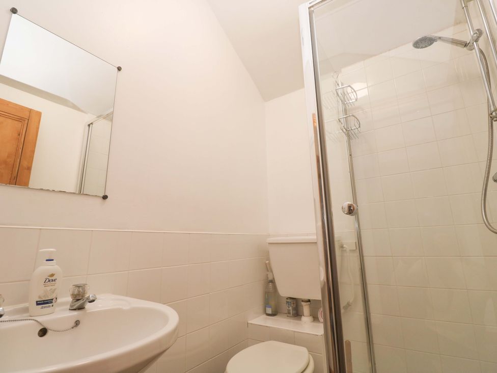 A bathroom with a sink and shower at Chyandaunce in Gulval