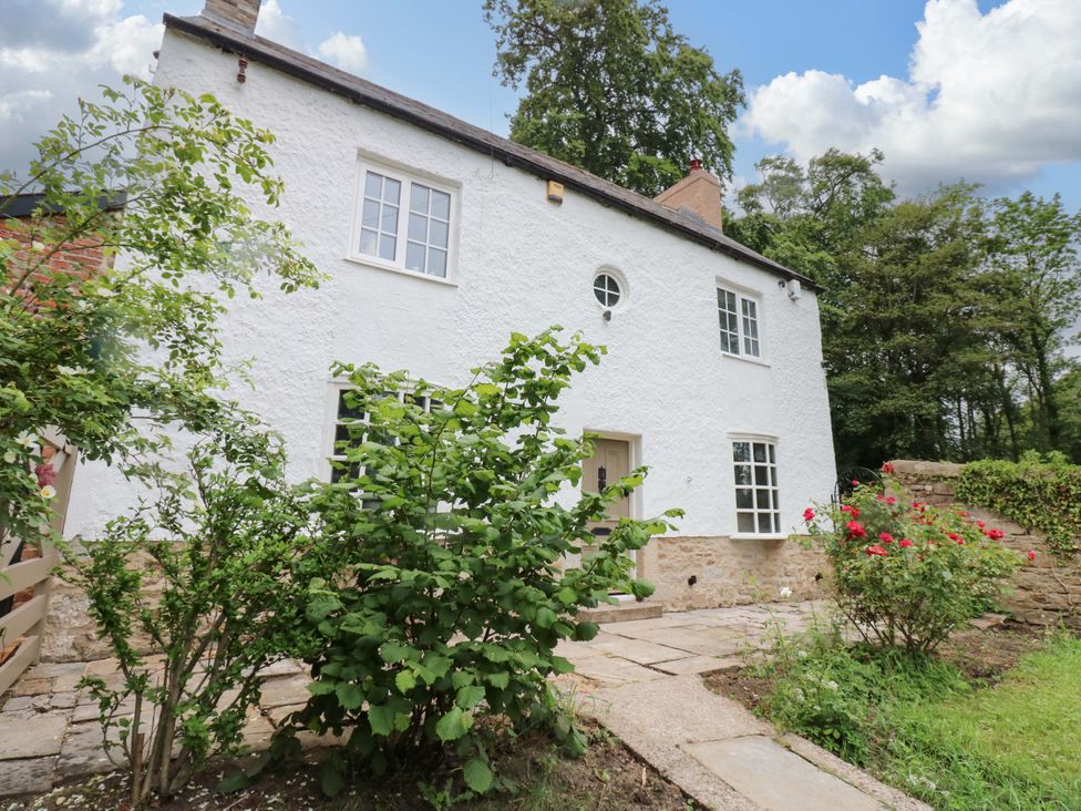 A house with a garden and pathway at White House in Durham