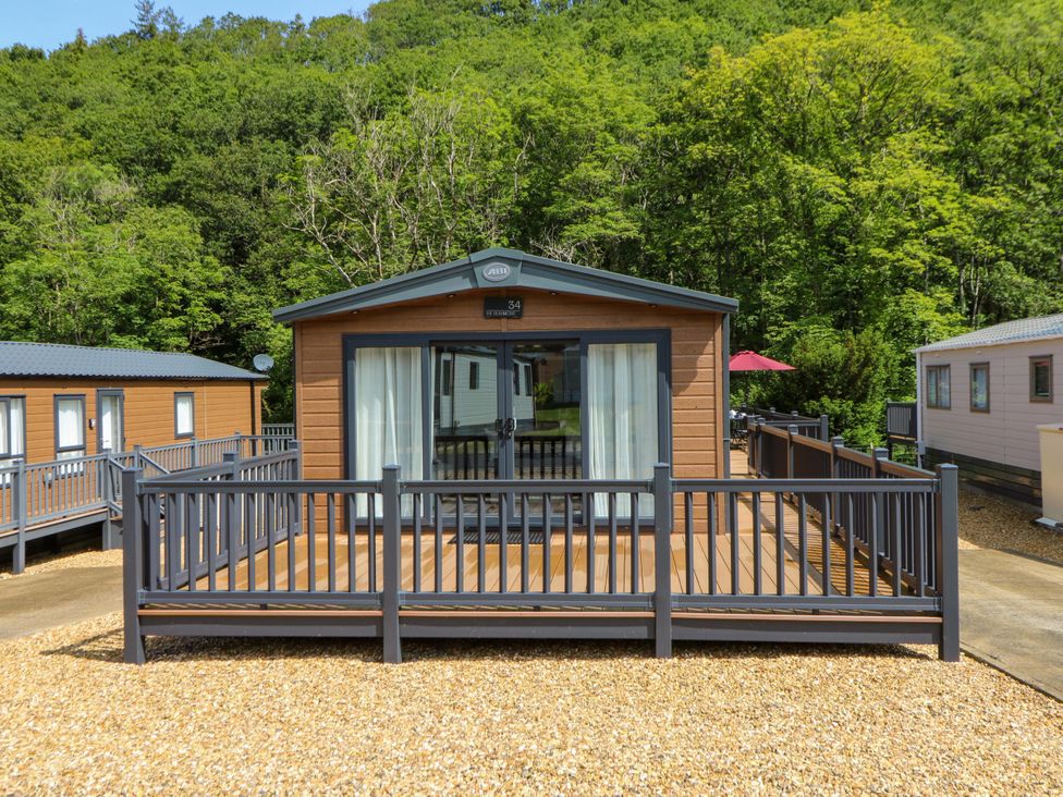 A holiday home with decking and sliding doors at The Beaumont No 34 in New Quay