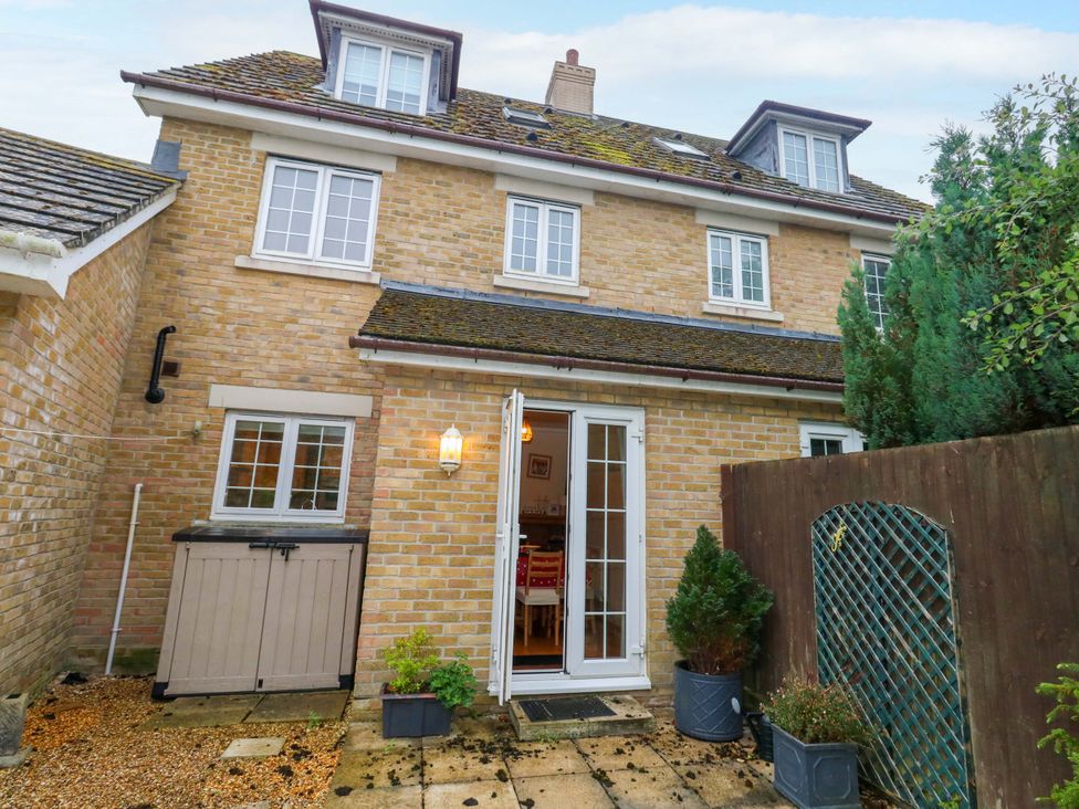 A house with a door and windows at Fairways House in Weymouth