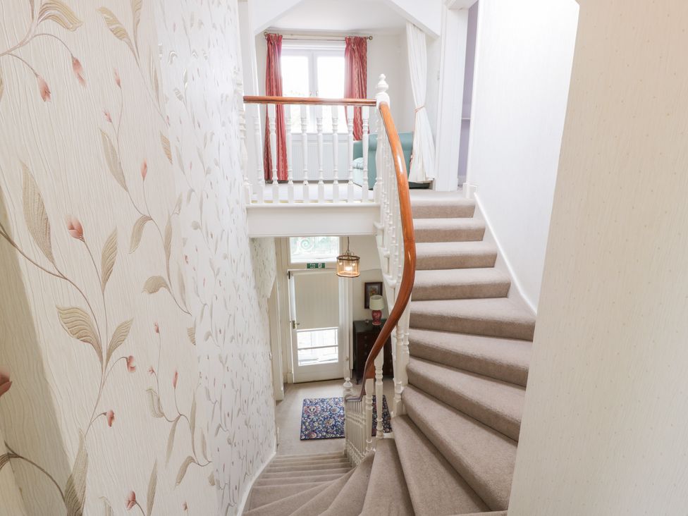 A staircase in a hallway at Marshill Farm house in Lanark