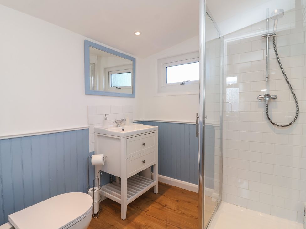 A bathroom with a sink and shower at Stella Maris in Torpoint
