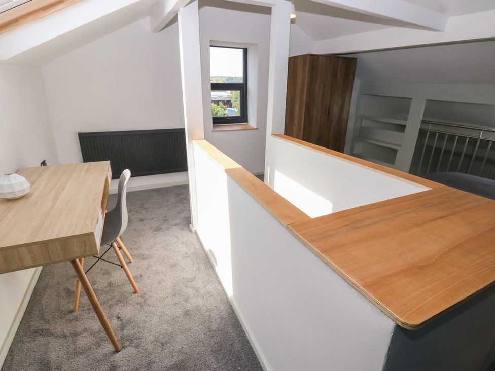 An office space with a desk and chair at Myrtle Loft in Keighley