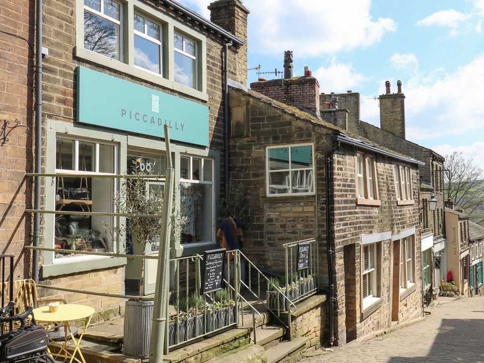 An outdoor shop with a sign in front at Myrtle Loft in Keighley