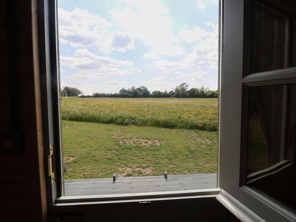 A view of a field from an open window at Robin in Monewden near Otley, Suffolk
