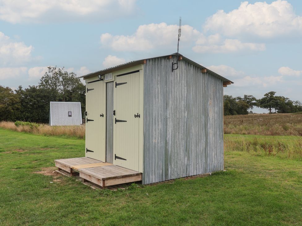 A shed with doors and steps at Robin in Monewden near Otley, Suffolk